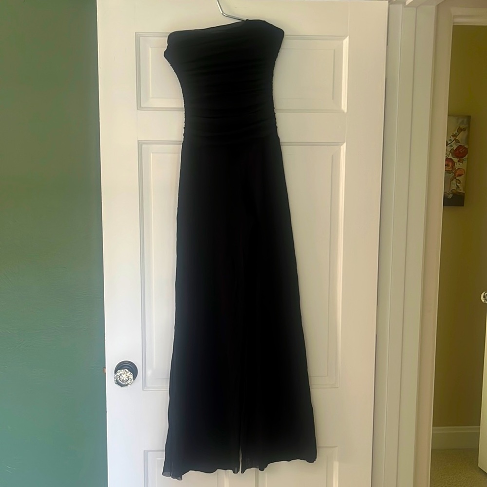 Jumpsuit.  Black strapless top. Flowy legs.  Very comfortable!!!